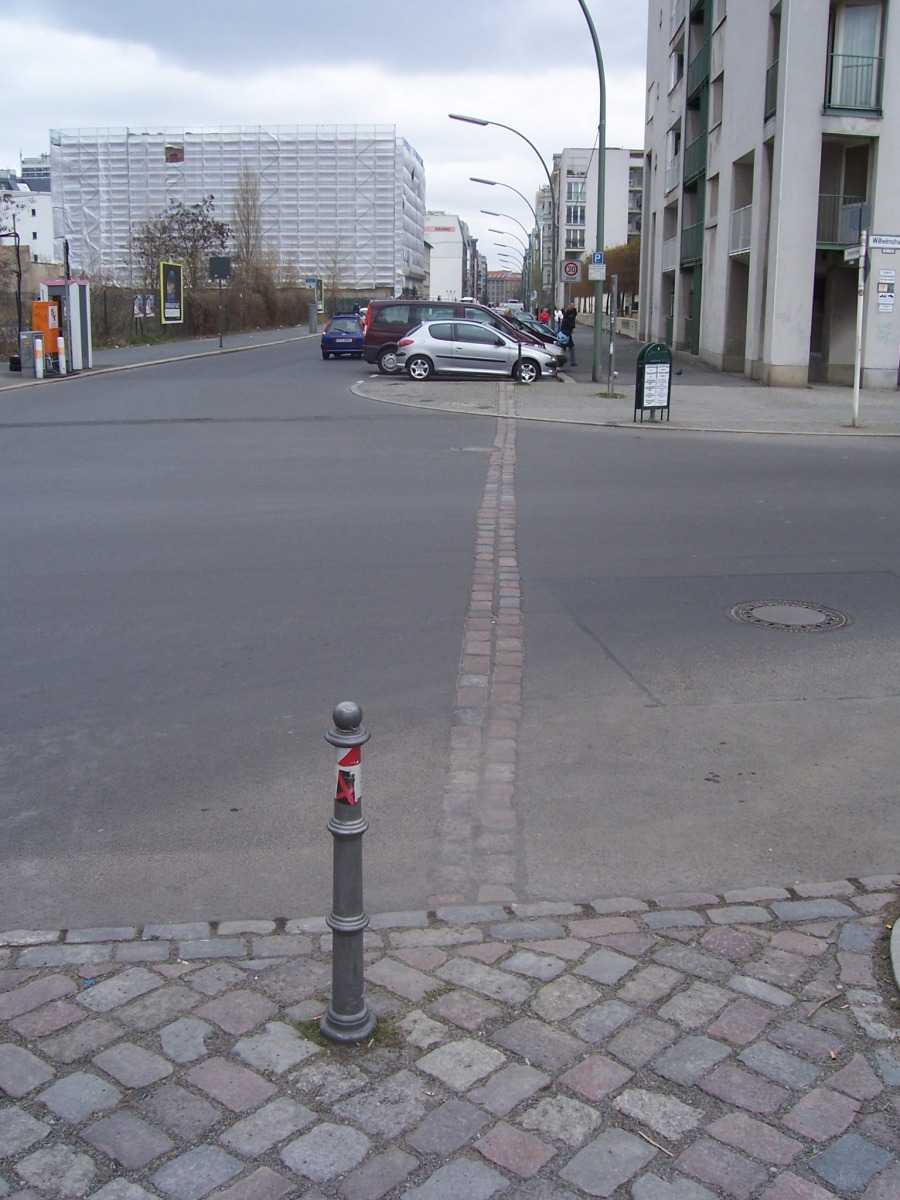 Marker of where the Berlin Wall used to be.